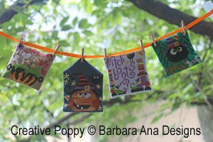 Halloween garland with all the ornaments and hang it in front of a window